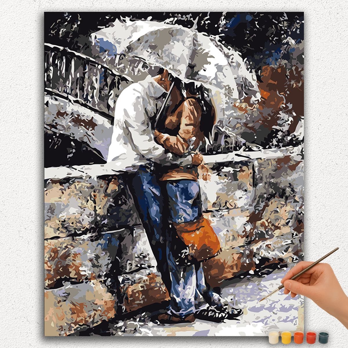 A romantic paint by numbers canvas showing a couple in silhouette standing under a black umbrella on a rainy street at sunset, with warm orange reflections on the wet pavement.